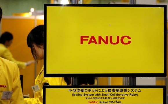 Fanuc slashes outlook, cites trade friction and weak tech demand