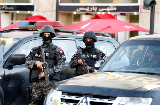 Woman blows herself up in central Tunis; nine wounded