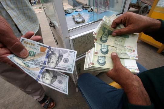 Iran says it will defy 'economic war' as U.S. reimposes curbs