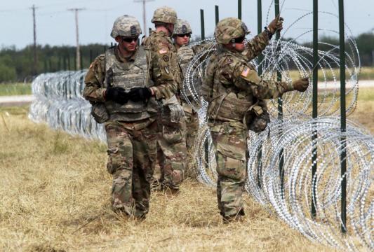 Exclusive: Pentagon balked at U.S. border troops building detention facilities - officials
