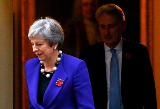 UK PM no closer to deal to leave EU as poll says Britons want to stay