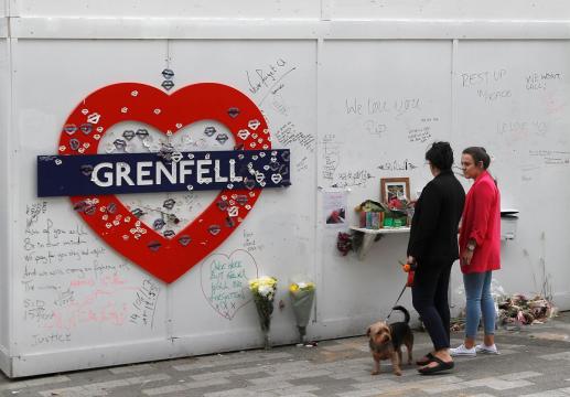 UK police arrest six men over burning of Grenfell Tower effigy