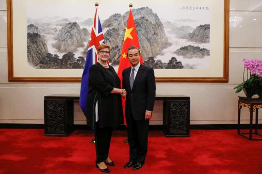 China shuns rivalry in Pacific as Australia says 'this is our patch'