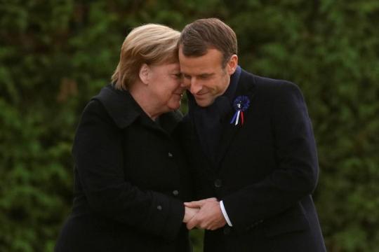 Leaders of France and Germany in poignant show of unity 100 years after WW1