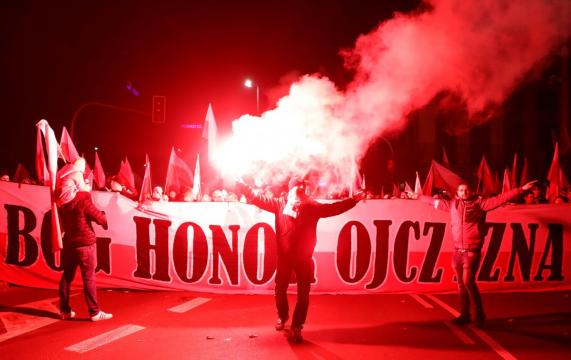 Poland's eurosceptic leaders, far right mark independence centenary at mass march