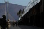 Commander says U.S. military does not view Central American migrants as 'enemies'