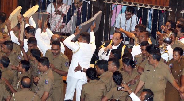 Throw the book at him: Sri Lanka parliament descends into farce