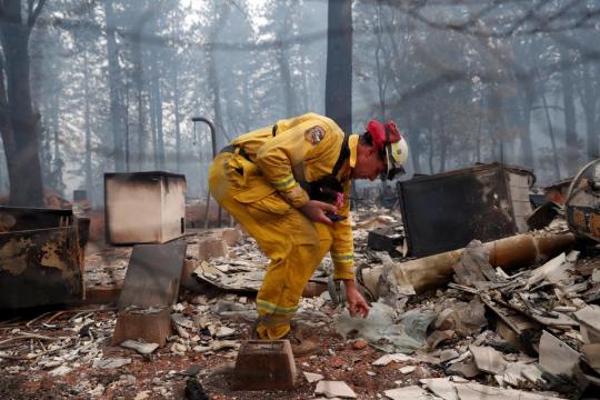 Wildfire that destroyed California town leaves 63 dead and 630 missing