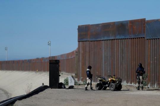 Central Americans stalled at U.S.-Mexico border, mull work offers