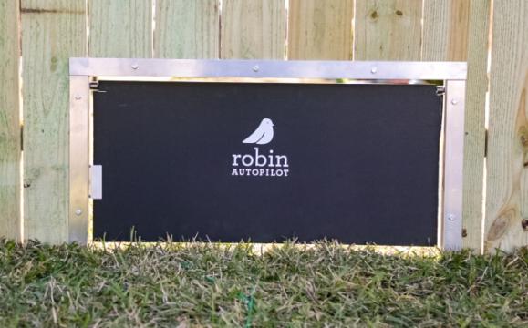 Robin’s robotic mowers now have a patented doggie door just for them