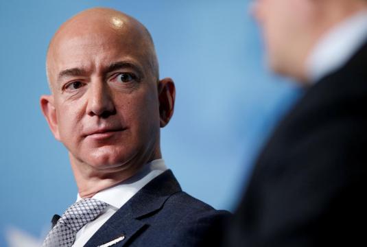 Amazon's Bezos says National Enquirer owner tried to blackmail him