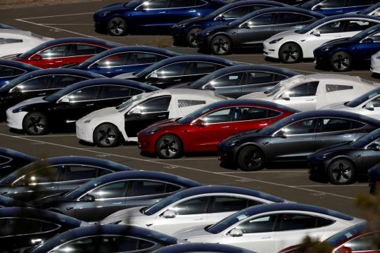 Tesla cuts Model 3 price for second time this year