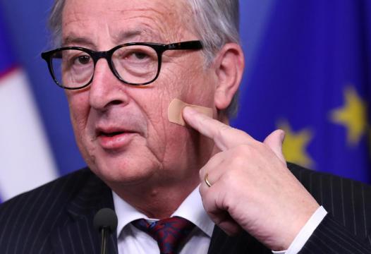 Don't blame Theresa May, EU's Juncker jokes of face wound