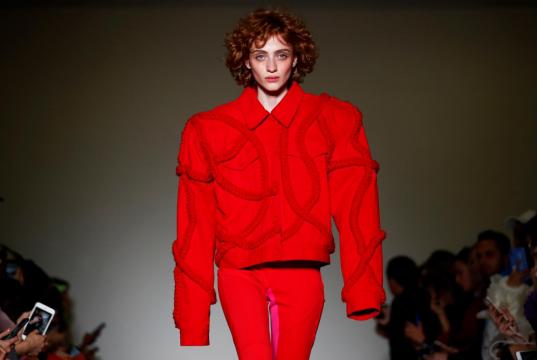 Gucci puts on masquerade catwalk as Milan Fashion Week opens