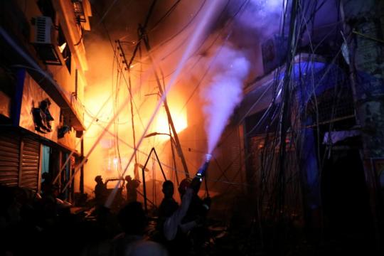 Death toll from Bangladesh building fire climbs to at least 56