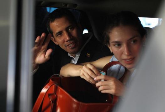 Venezuela's Guaido risks arrest as he returns home to defy Maduro