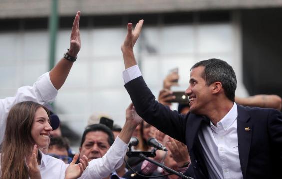 In jab at Maduro, Guaido makes triumphant return to Venezuela