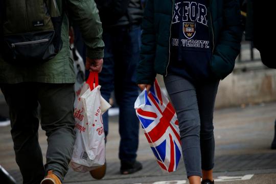 UK shoppers slow their spending ahead of Brexit, some stockpile