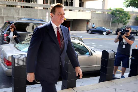 Judge sentences Trump ex-aide Manafort to under four years in prison