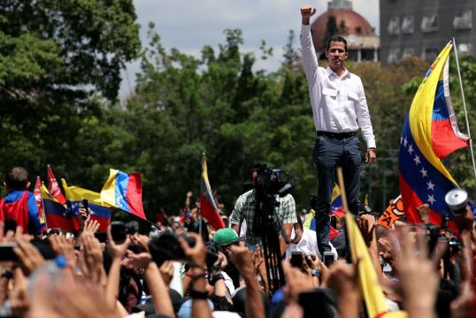 Opposition protesters scuffle with police as Venezuela's lights flicker