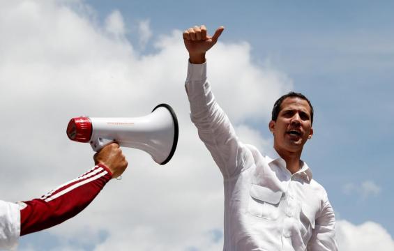 Venezuela's Guaido calls for massive protest as blackout drags on