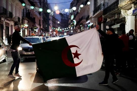 Algeria's Bouteflika abandons re-election bid after weeks of protest