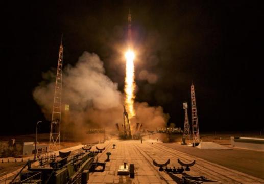 Months after aborted flight, U.S.-Russian crew makes smooth trip to space station