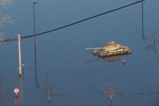 Nebraska floods inundate military bases, cut off nuclear plant