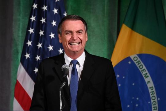 Bolsonaro touts 'changed', U.S.-friendly Brazil to Washington