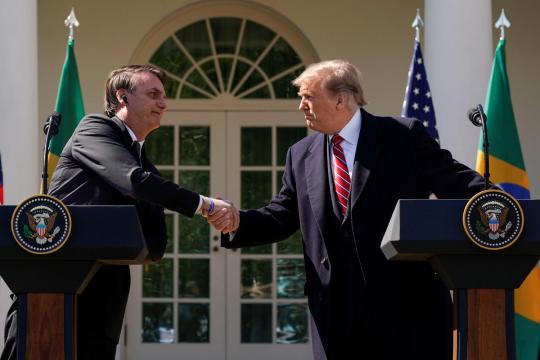 Trump forges bond with Brazil's Bolsonaro in White House visit