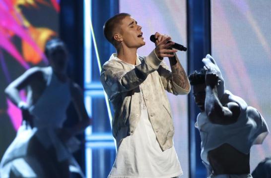 Justin Bieber puts music on hold while struggling not to fall apart