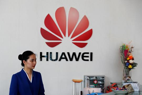 Huawei urges U.S. to drop 'loser's attitude' as carrier business revenue slips