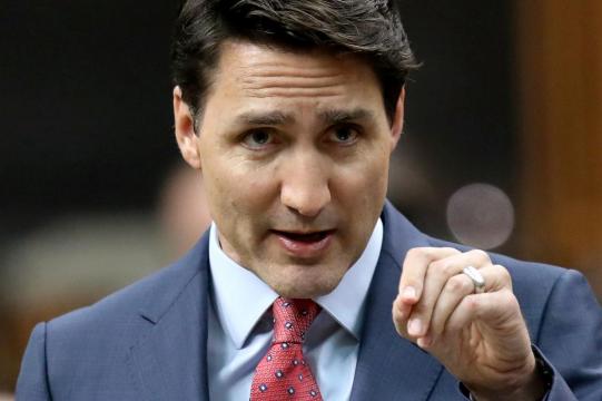 Canada's Trudeau sticks to guns as scandal threatens re-election