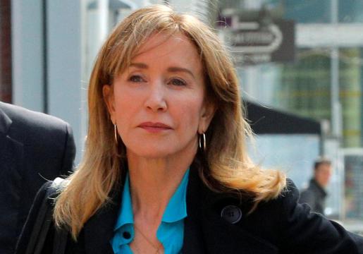 Felicity Huffman arrives at Boston court to face college admissions cheating charges