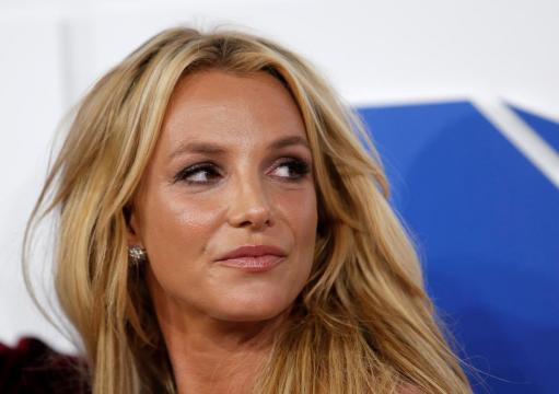 Britney Spears takes some 'me time' after dad's second surgery