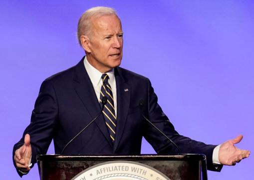 Amid complaints of unwanted touching, Biden jokes he got 'permission' to hug