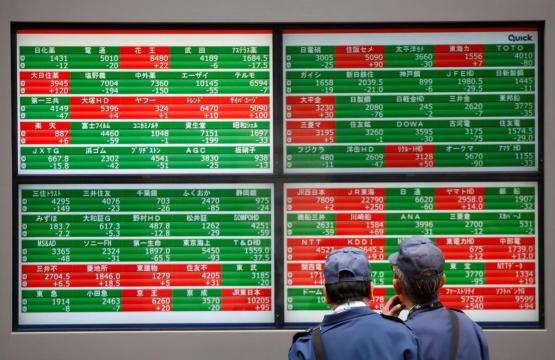 Asia shares weighed by cautious mood, oil settles