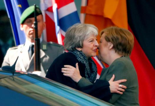 May heads to France after asking Merkel to help on Brexit impasse
