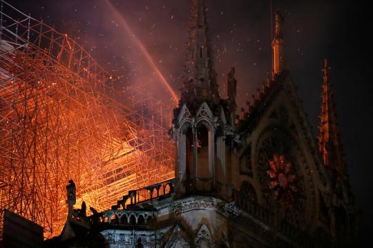 Blaze devastates Notre-Dame; Paris firefighters fear for one bell tower