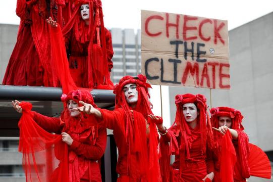 London climate-change arrests top 120 on second day of street protests