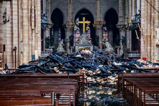 Gutted but 'valiant', Notre-Dame still stands