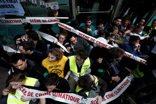 Climate change protesters descend on France's SocGen, energy companies