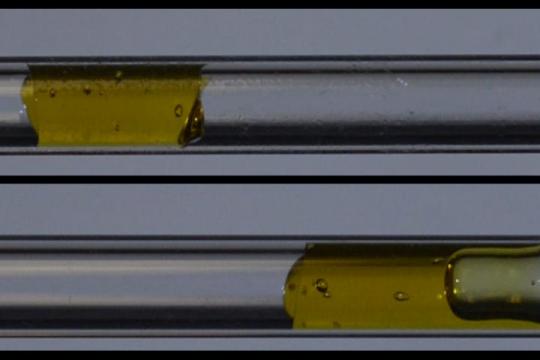 How slippery surfaces allow sticky pastes and gels to slide