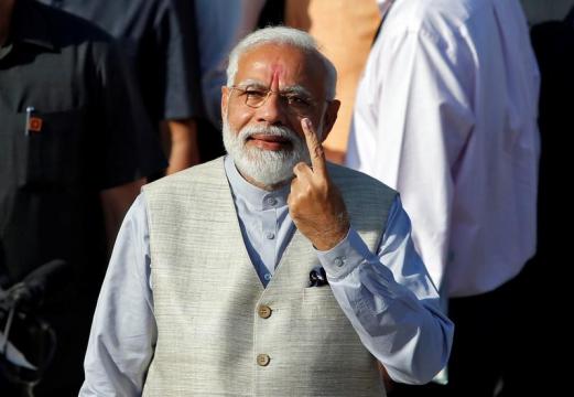Indian PM votes in general election, calls for national security