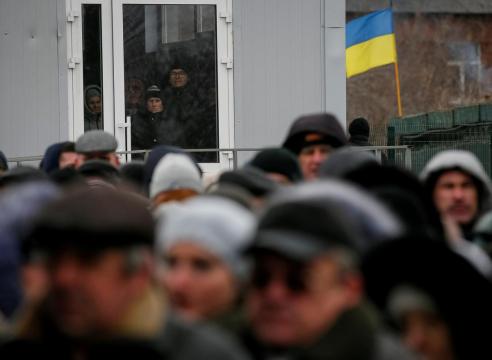 Russia offers passports to east Ukraine, president-elect decries 'aggressor state'