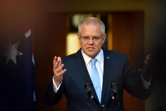 Australian PM promises migration cut, refugee freeze if re-elected