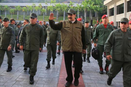 Venezuela court issues warrant for opposition figure Lopez as Maduro seeks to show military loyalty