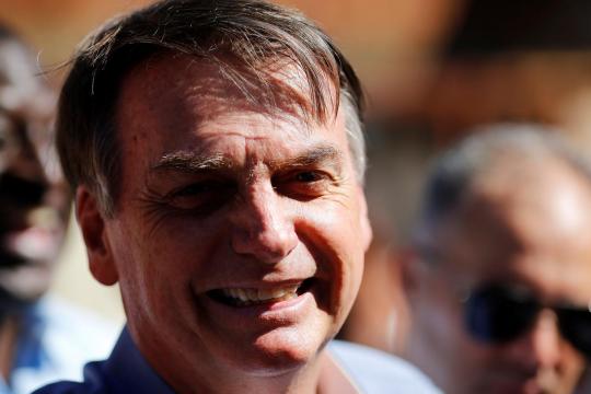 Brazil's far-right Bolsonaro nixes U.S. trip in face of protests