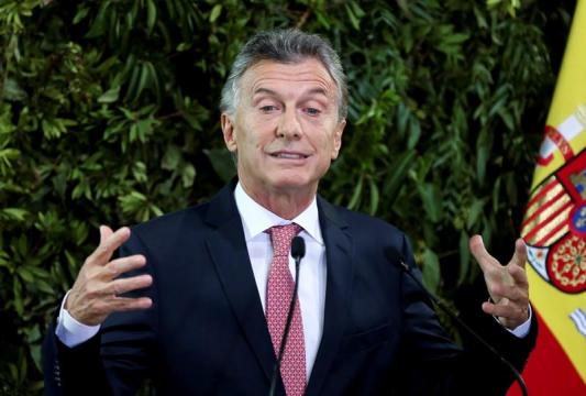 Argentina's Macri seeks accord with rivals to calm volatile markets