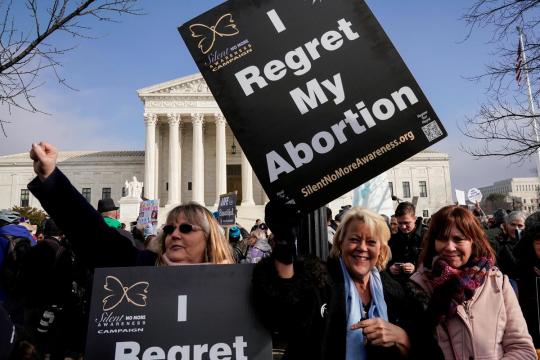 Georgia governor signs heartbeat abortion ban, joining a U.S. movement